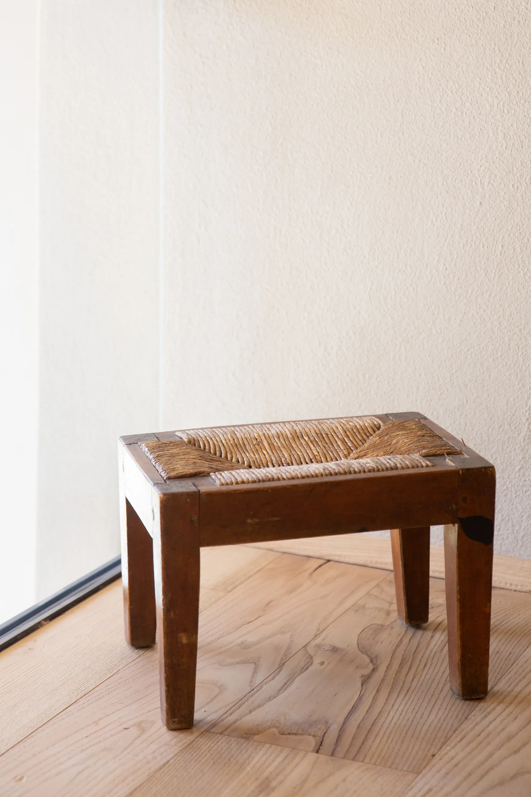 Vase of flowers on a wooden table